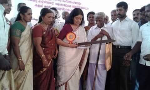 Travancore Maharani Sri Sethu Lakshmi Bai Thampurati with Dr. Vinu Varma's family, viewing the official sword and copper plate of Anantha Padmanabhan